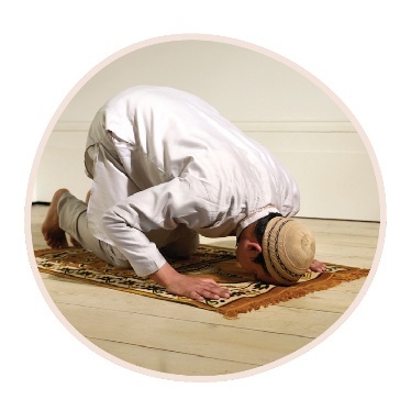 A person practising their religion.