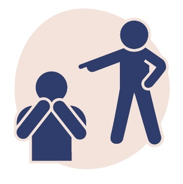 A person looking worried while someone standing behind them points at them.