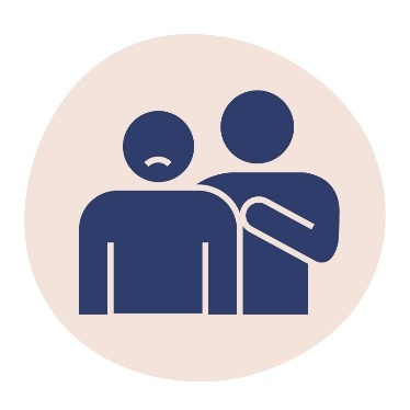 A person looking upset while someone behind them touches their arm.