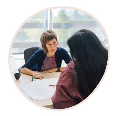 A person having a meeting with someone.